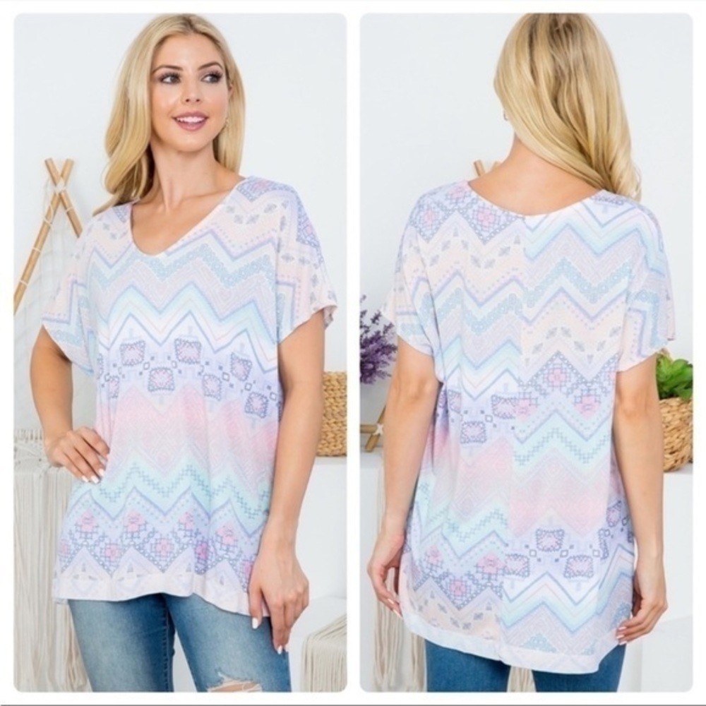 NWT Lovely J Boutique Aztec design S/S V neck tunic with side slits. Multi color